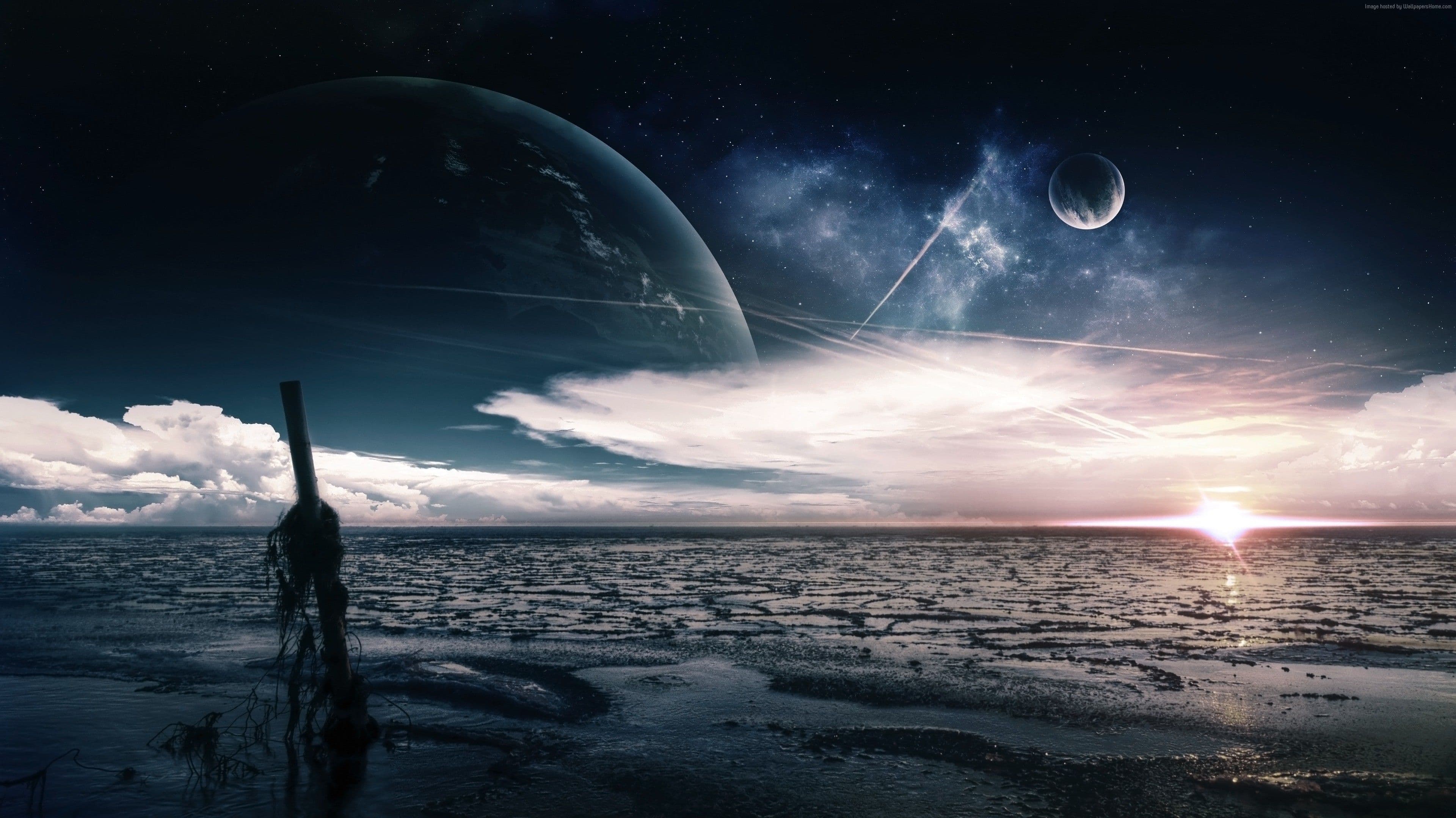 Wide atmospheric shoreline scene with a planet horizon